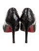 Christian Louboutin Snakeskin Animal Print Pumps