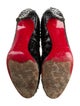 Christian Louboutin Snakeskin Animal Print Pumps