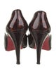 Christian Louboutin Patent Leather Animal Print Pumps