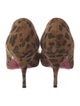 Christian Louboutin Suede Animal Print Pumps