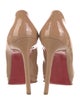 Christian Louboutin Patent Leather Pumps