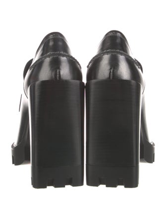 Christian Louboutin Patent Leather Pumps