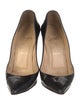 Christian Louboutin Patent Leather Pumps