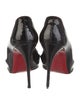 Christian Louboutin Patent Leather Pumps