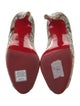 Christian Louboutin Snakeskin Animal Print Pumps