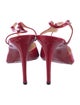 Christian Louboutin Patent Leather T-Strap Pumps
