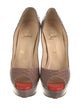 Christian Louboutin Snakeskin Animal Print Pumps