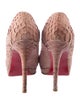 Christian Louboutin Snakeskin Pumps