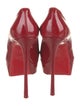 Christian Louboutin Patent Leather Pumps