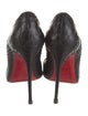 Christian Louboutin Snakeskin Animal Print Pumps