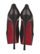 Christian Louboutin Leather Pumps