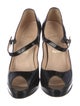 Christian Louboutin Patent Leather Pumps