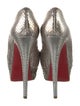 Christian Louboutin Snakeskin Animal Print Pumps