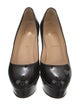 Christian Louboutin Patent Leather Pumps