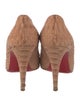Christian Louboutin Snakeskin Animal Print Pumps