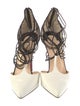 Christian Louboutin Patent Leather Animal Print T-Strap Pumps