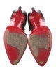 Christian Louboutin Patent Leather Pumps