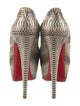Christian Louboutin Snakeskin Animal Print Pumps