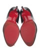 Christian Louboutin Patent Leather Pumps