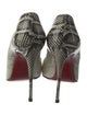 Christian Louboutin Patent Leather Animal Print Pumps