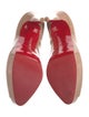 Christian Louboutin Patent Leather Pumps