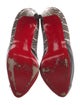 Christian Louboutin Snakeskin Animal Print Pumps