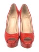 Christian Louboutin Snakeskin Animal Print Pumps