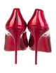 Christian Louboutin Patent Leather Pumps