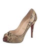 Christian Louboutin Snakeskin Animal Print Pumps
