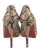 Christian Louboutin Snakeskin Animal Print Pumps