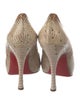 Christian Louboutin Snakeskin Animal Print Pumps