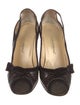 Dolce & Gabbana Snakeskin Bow Accents Pumps