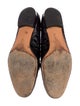Ferragamo Gancini Logo Embossed Leather Loafers
