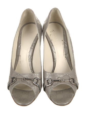 Gucci GG Signature Leather Pumps