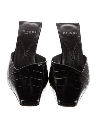 Gucci Interlocking G Logo Embossed Leather Mules