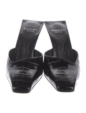 Gucci Interlocking G Logo Embossed Leather Mules