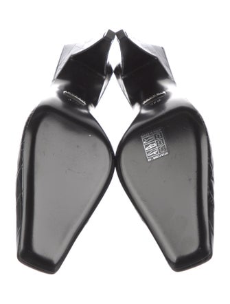 Gucci Interlocking G Logo Embossed Leather Mules