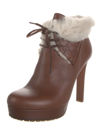 Gucci GG Signature Leather Lace-Up Boots