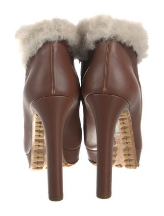 Gucci GG Signature Leather Lace-Up Boots