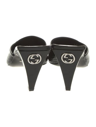 Gucci Interlocking G Logo Embossed Leather Mules