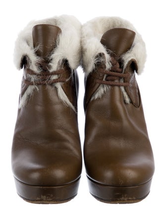 Gucci GG Signature Leather Lace-Up Boots