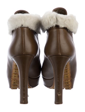 Gucci GG Signature Leather Lace-Up Boots