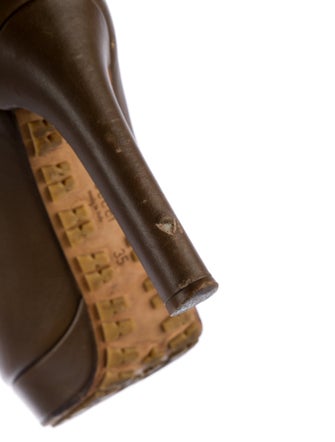 Gucci GG Signature Leather Lace-Up Boots