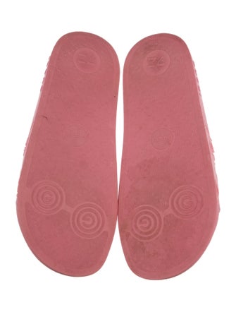 Gucci GG Signature Rubber Slides