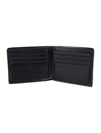 Gucci GG Signature Leather Bifold Wallet