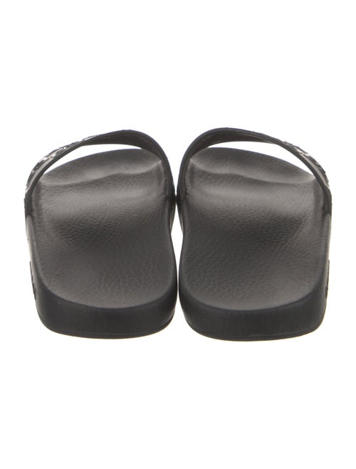 Gucci GG Signature Rubber Slides