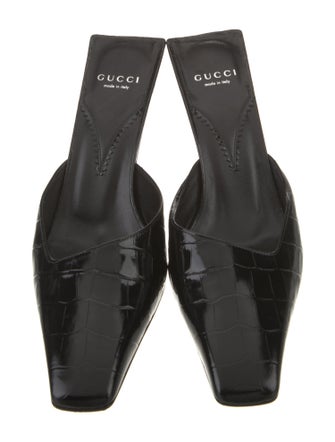 Gucci Interlocking G Logo Embossed Leather Mules