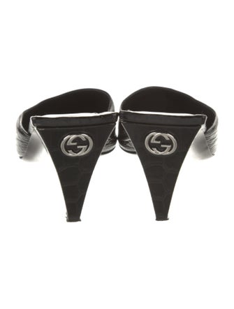 Gucci Interlocking G Logo Embossed Leather Mules