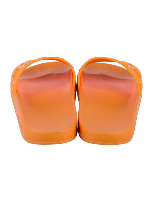 Gucci GG Signature Rubber Slides