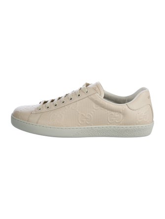 Gucci GG Signature Embossed Leather Sneakers